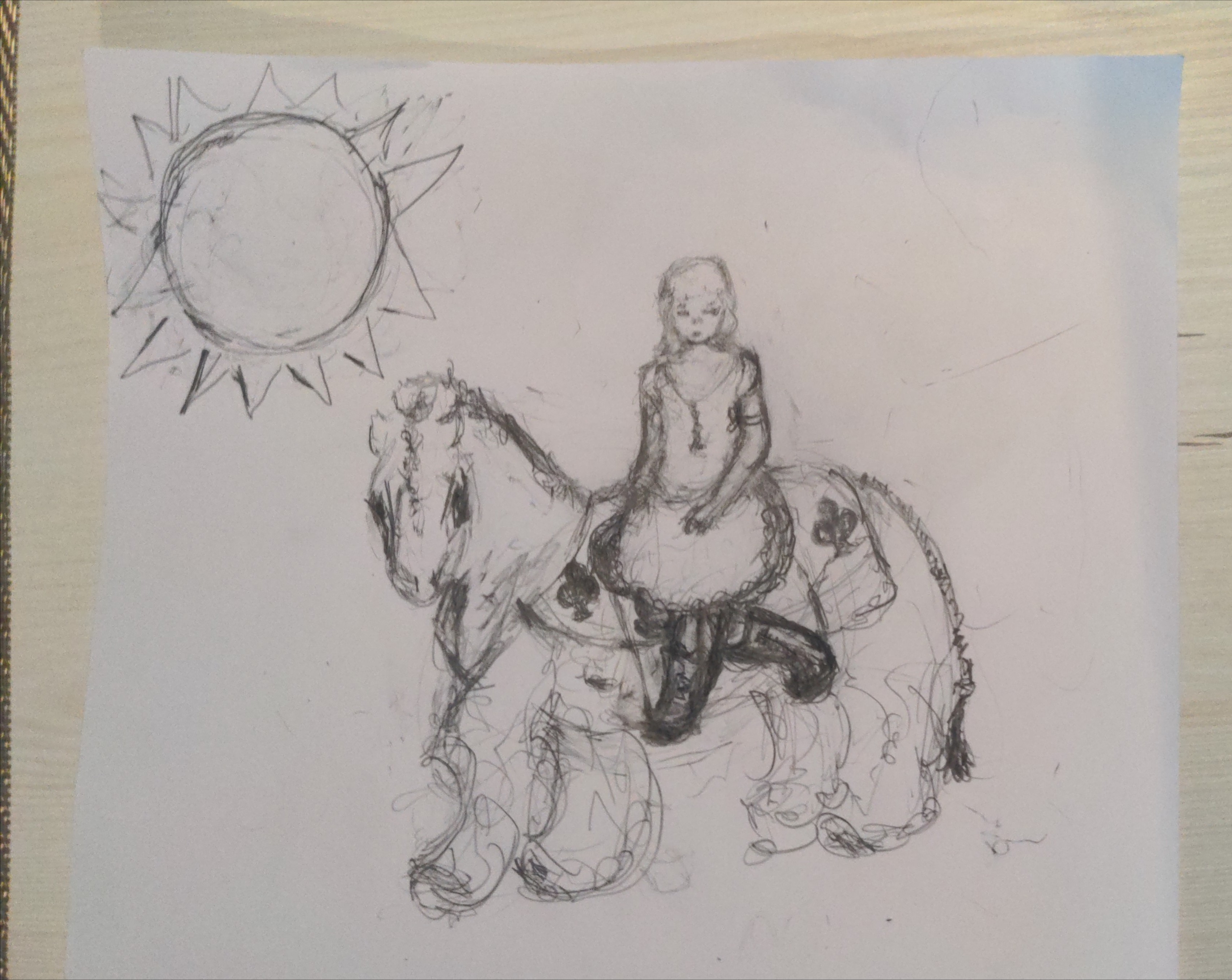 Dulcinea sitting on Rocinante